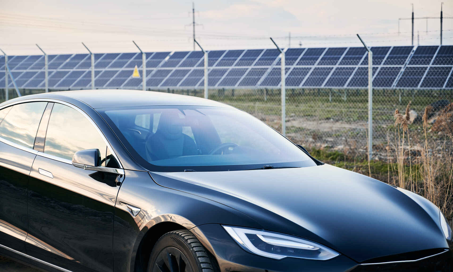 A Tesla parked on the side of the road in Denver Colorado