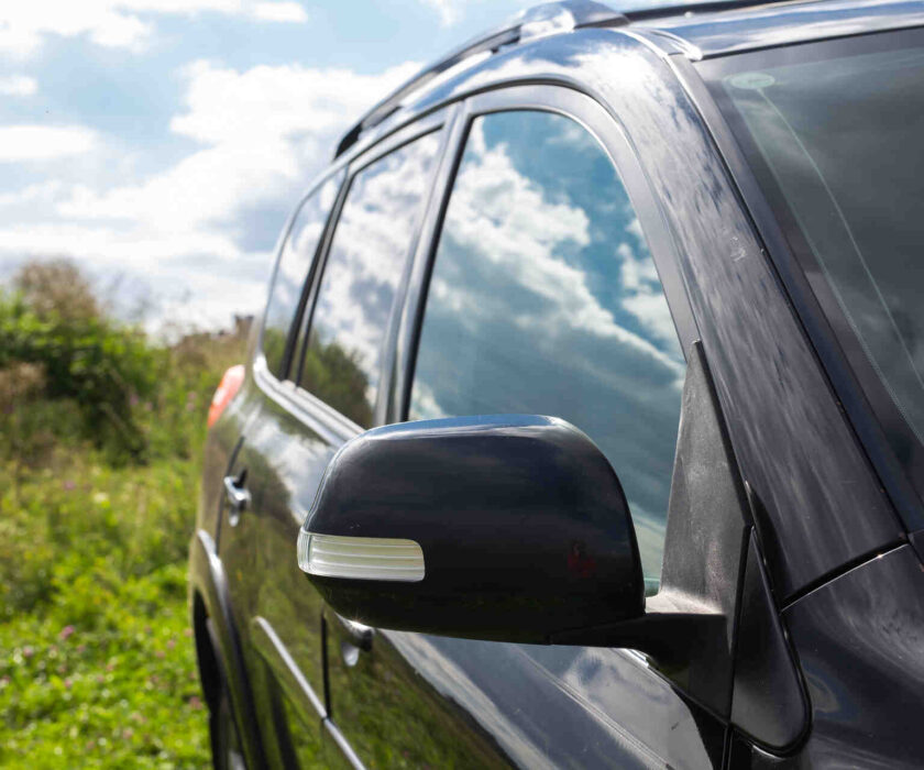 Car with ceramic window tint off roading in Denver